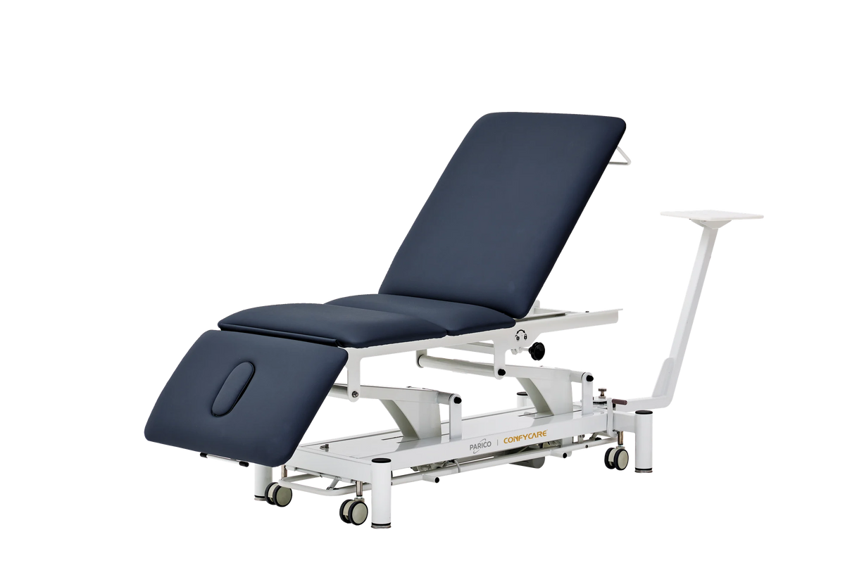 PARICO Coinfycare EL04PRO23 traction table with backrest fully raised and head section lowered, Signal White frame, navy blue upholstery